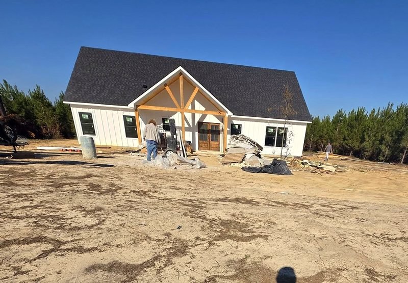 Construction — Custom home build with stone-fireplace great room, photo 1 of 2