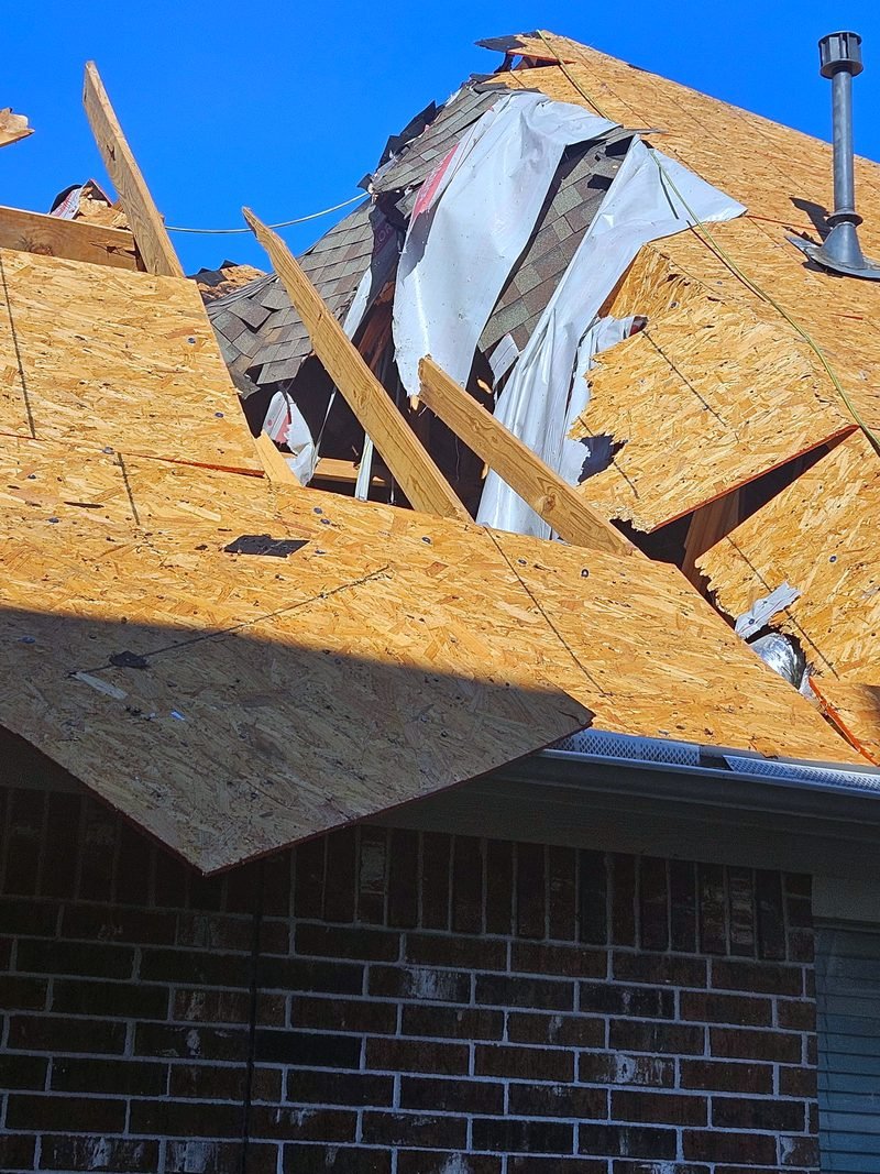 Roofing — Roof rebuild after storm damage, photo 1 of 4